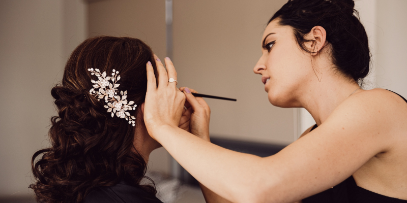 lis doing the makeup for a bridal party